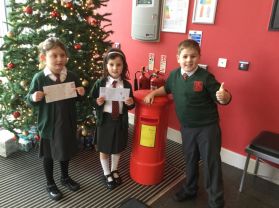 Year 3 Mrs H/Mrs A - Posting our letters to Santa