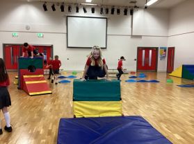 Year 5 Room 13 have enjoyed using the large apparatus in PE